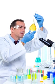 laboratory scientist working at lab with test tubes and microscope