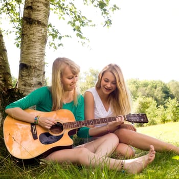 Two girls are having fun in the summer sun