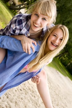 Two girls are having fun in the summer sun