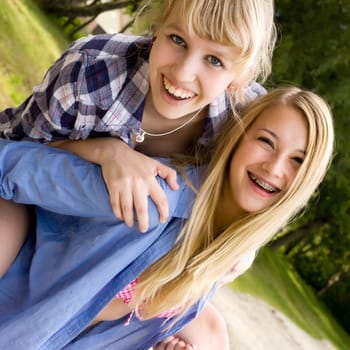 Two girls are having fun in the summer sun
