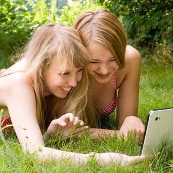 Two girls are having fun in the summer sun