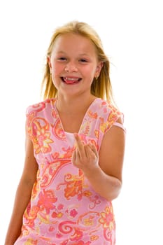 little girl showing middle finger, isolated on white