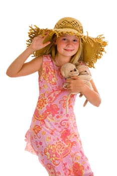 cute little girl with cuddlies and summer hat, isolated on white