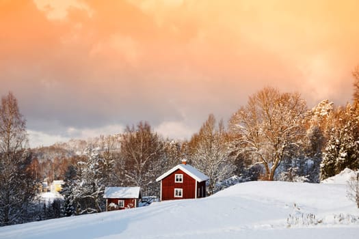 old farm in a snowy winter landscape. smaland. sweden