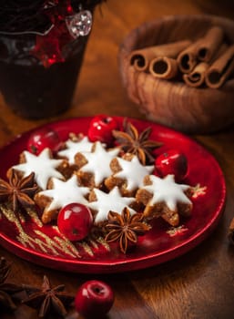 Homemade gingerbread star cookies for Christmas on the plate