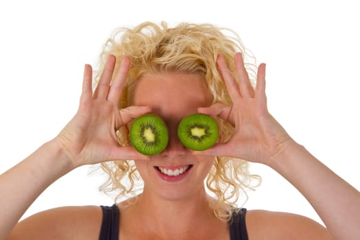 Young woman holding kiwi halves isolated on white background