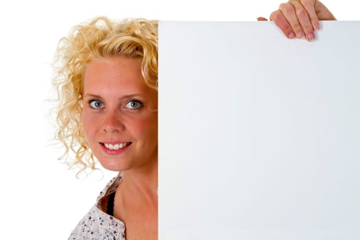 Attractive woman holding billboard isolated on white background