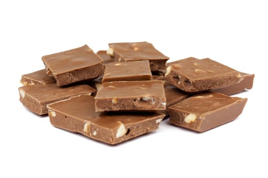 Chocolate,close-up of chocolate pieces against white background