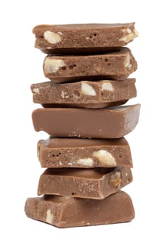 Chocolate,close-up of chocolate pieces against white background