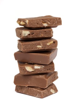 Chocolate,close-up of chocolate pieces against white background