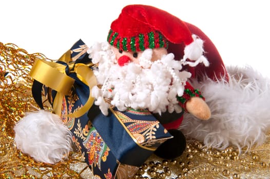 Santa Claus doll an christmas gift on a white background