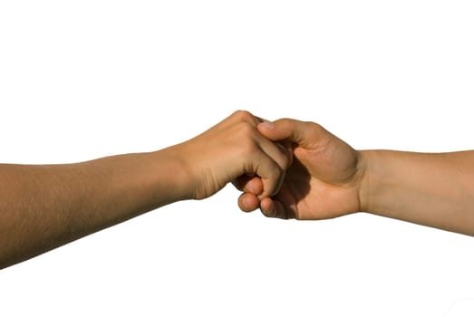 a careful handshake between two young hands, isolated on white