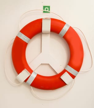Red  lifebuoy on board the passenger ship