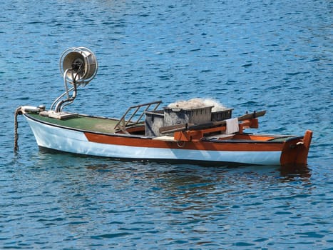 old wooden fishing boat with nets