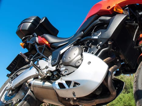 powerful orange sport bike on the open space