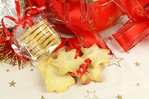 Delicious fresh baked Christmas shortbread wrapped in cellophane and in a Xmas tin.