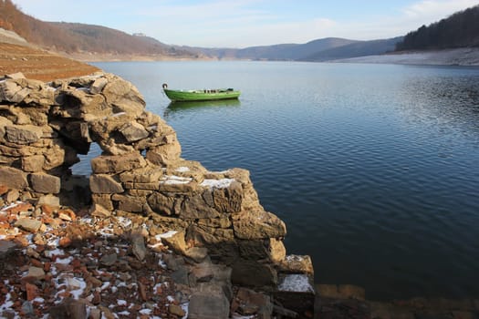 Green fishing boat at the surfaced Bericher Hütte