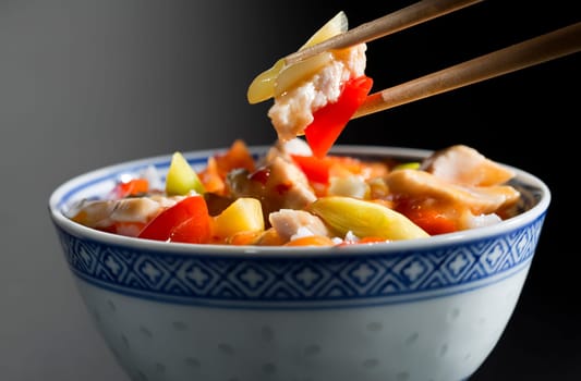 Rice with chicken and vegetables close up