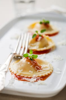 Ravioli pasta with red tomato sauce