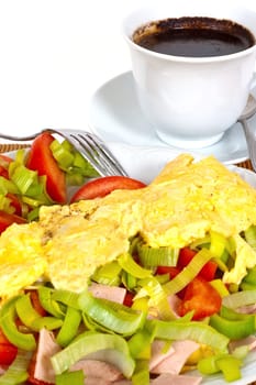 Omelet with vegetables and coffee for breakfast