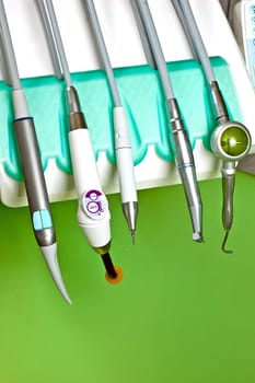 Dentist tools set with drill on rack