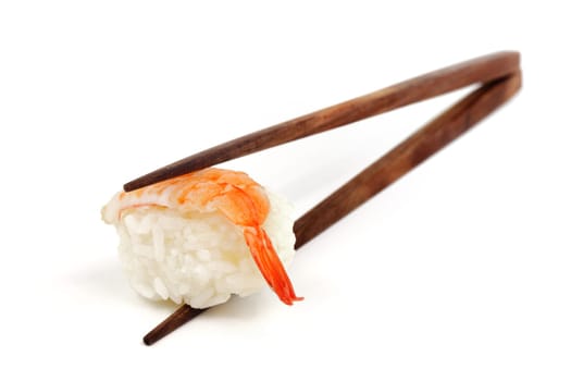 Sushi with chopsticks,Japanese food against white background