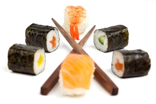 Sushi with chopsticks,Japanese food against white background