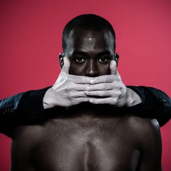one african man hand on his mouth Freedom of speech concept