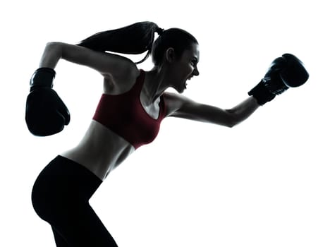 one caucasian woman boxing exercising in silhouette studio  isolated on white background