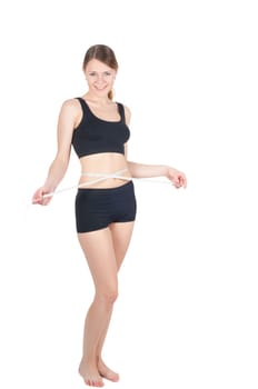 Fitness woman with tape-measure, isolated on white