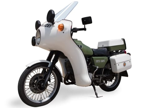 Side view of oblique front of an East German police motorcycle isolated on white