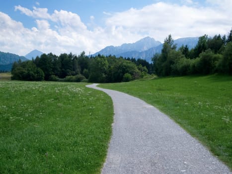 View of the hiking trail around the Hopfensee in the Bavarian Allgäu