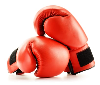 Pair of red leather boxing gloves isolated on white