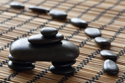 details of a tranquil scene, made withe stack of black pebbles.