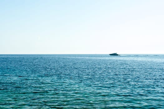 One yacht on open water