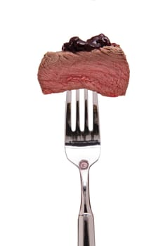 Cut-out fillet from the skin on a fork