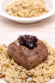 Fillet of venison with jam of cranberries and spaetzle