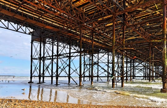 The Brighton Pier framework seen from underneath, HDR look