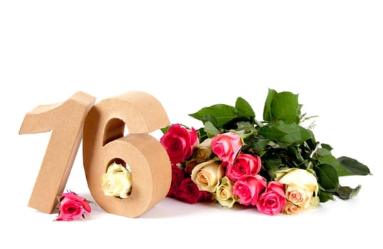 Number of age in a colorful studiosetting,surrounded with roses