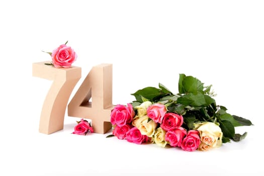 Number of age in a colorful studiosetting,surrounded with roses