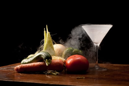 Still life of vegetables and liquid nitrogen