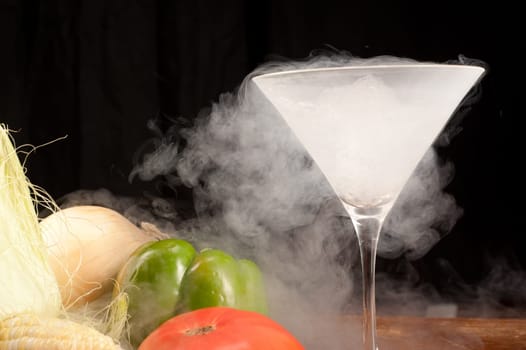 Still life of vegetables and liquid nitrogen