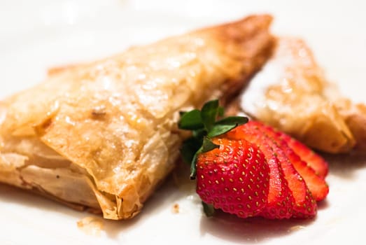 Filled Apple Pastries with Strawberries and Sugar