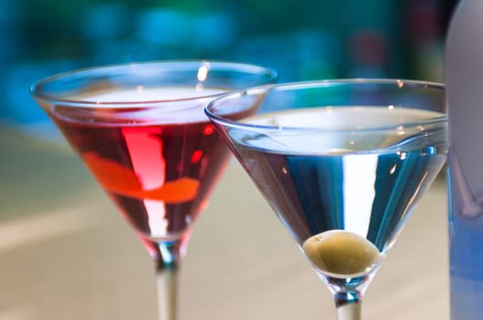 Pair of martini glasses at a bar