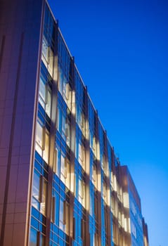 Commercial building, architectural detail, seen at dusk