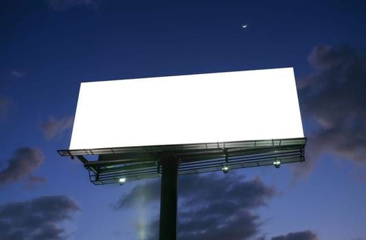 Billboard at sunset with new moon