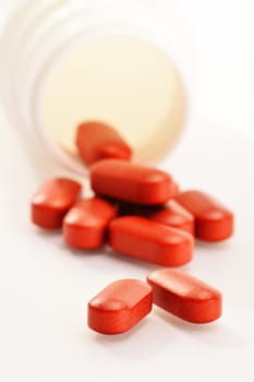 Composition with dietary supplement capsules and drug pills