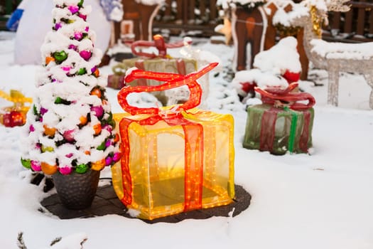 Outdoor Christmas light display in the snow