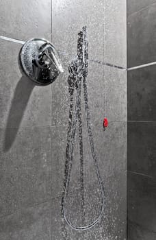 Shower handle with water falling