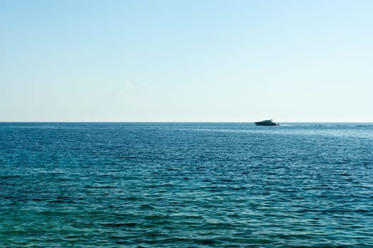 One yacht on open water